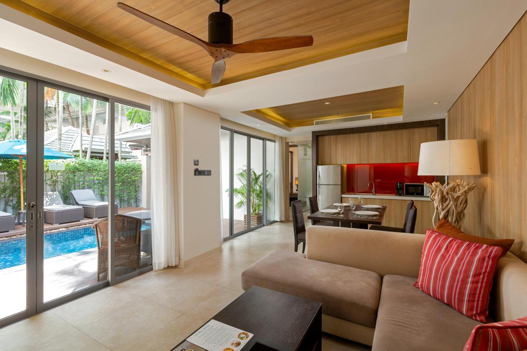 Grand Mercure Phuket Patong Екстериор снимка Living room of a pool villa at The Village
